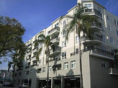 Private residential entrance to this mixed use building. Retail businesses on first floor on Wilshire Blvd.
