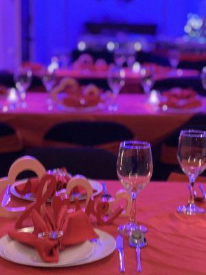 Red linen and napkin set up for the get together