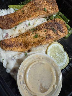 Blackened salmon with an extra piece of salmon