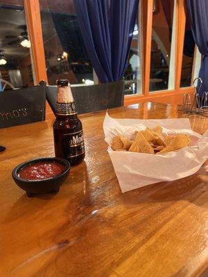 Appetizers of chips, fresh salsa and one of my favorite Mexican beers!