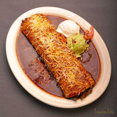 Burrito Chipotle with your choice of meat, scoop of sour cream and guacamole.