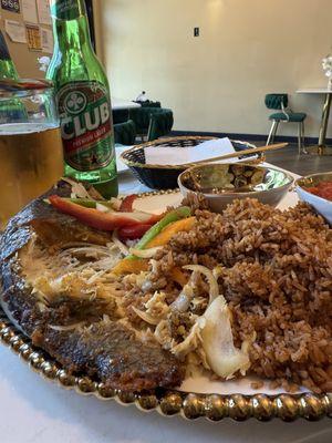 Tilapia with jollof rice