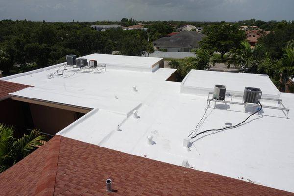 Silicone roof coating