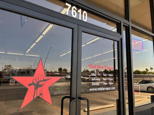 Exterior - Door with store hours