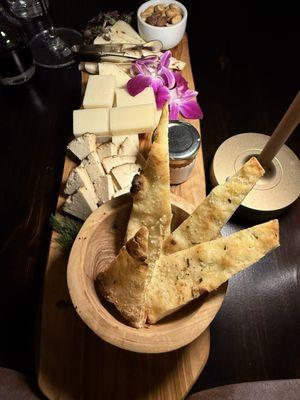 Cheese board with a variety of fabulous choices to be paired with nuts, honey and warm, seasoned, tasty pita!