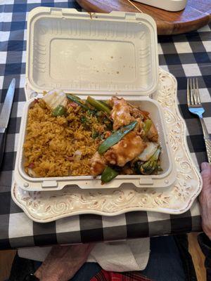 Chicken and mixed vegetables with fried rice.