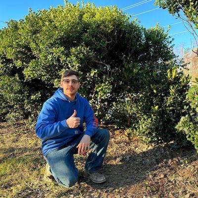 James Thompson and the bushes he planted in our privacy hedge.