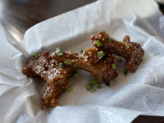 "Duck Wings" (crispy duck wings tossed in orange-ginger sauce)