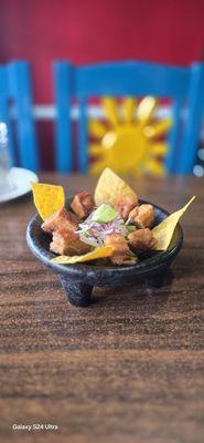 Crispy pork belly and Guacamole.