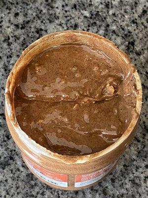 Mixed up you must mix!! Crunchy bits add to the deliciousness. Shelf stable too amazing texture i'm in love!!