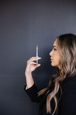 Ideh Macdonald Founder FNP Nurse Practitioner & Injector Syringe