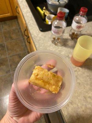 Baklava dwarfed in mini cup.