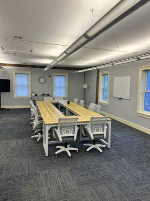 The conference room is fully customizable, and available to rent on an hourly basis.