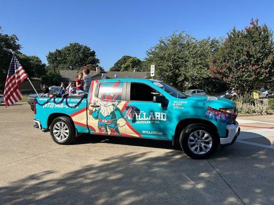 Willard Heating, Cooling, & Plumbing work truck near the a home