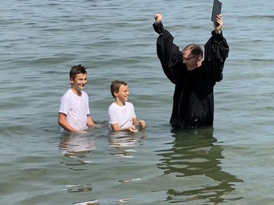 Open ocean baptism with Father Gray
