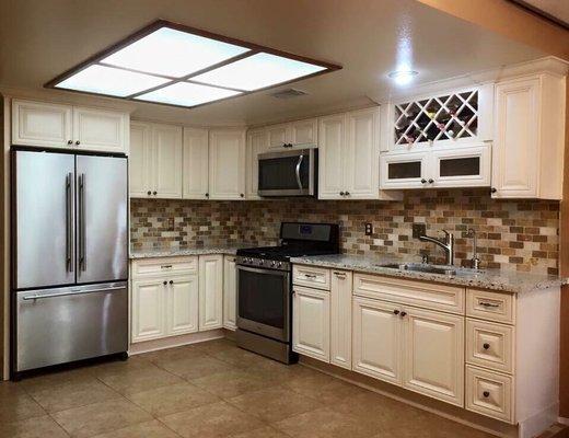 Antique white kitchen cabinets