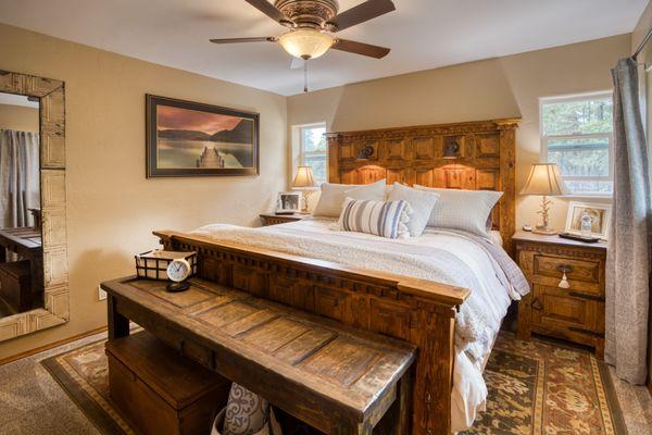 Garden Bungalow bedroom with king-size bed and stunning views.