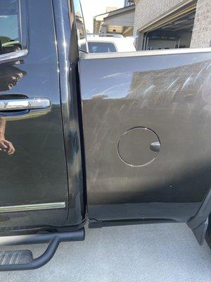 The "black" he attempted to match, pictured as well are the swirl marks, they cover the entire vehicle