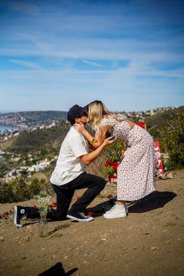 Engagement photo at a cliff overlooking laguna beach