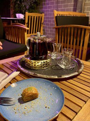 Rosehip tea and bite of baklava