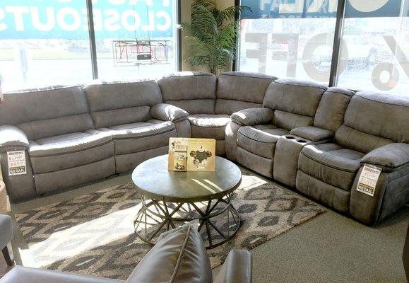 We have your living room furniture needs, like this deluxe sectional piece
