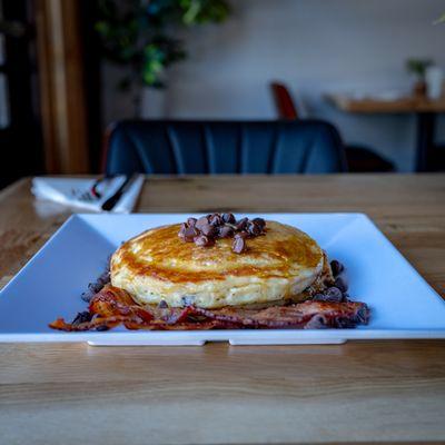 Chocolate Chip Pancakes with Bacon, covered in real Maple Surup