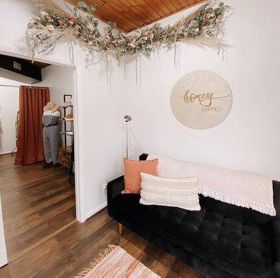Our cozy entry way where we can guarantee you'll be greeted with a warm smile + positive vibes every time.