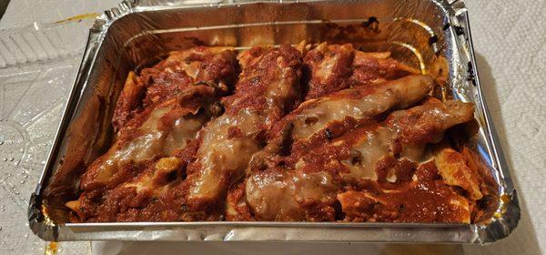 Tiny bit of pasta at the bottom. Hadn't taken a bite yet - plenty of foil showing. Used to be filled halfway at least??