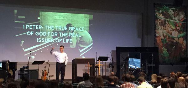 Pastor Larry Kirk preaching at Christ Community Church