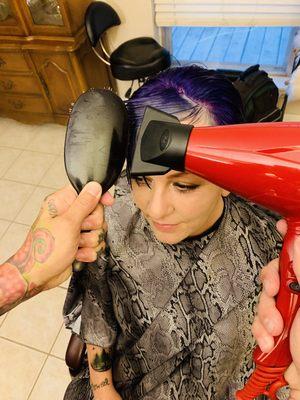 Wrap dry the hair for a smooth finish.