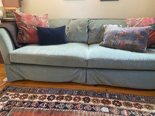 Front skirts hang so that they look like a swag--they are not flat and crisp as the sofa I saw in the store or as shown on the website.