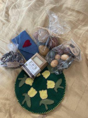 Decorative eggs, candle coaster, soap, potpourri, and a felt envelope