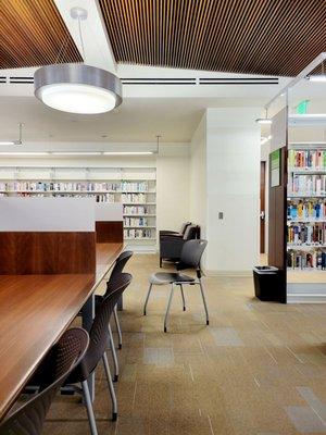 Spacious cubicle desks and clean study area.