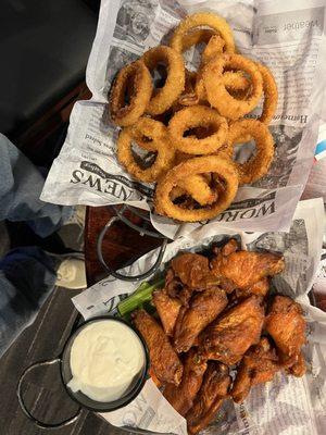Home Plate Bar and Grill. Chicken wings and onion rings.