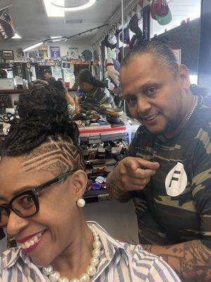 I normally have short hair but wanted braids for vacation, Eddy still did the fire design on my sides and undercut