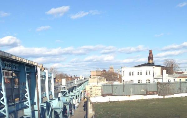 View from the Market Frankford El (MFL) w/ the old dairy milk bottle in background