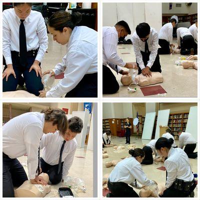 Our Administration of Justice Academy students learning life-saving CPR skills