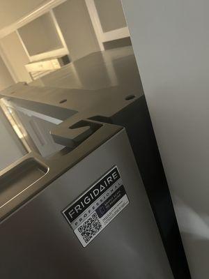 Refrigerator with door open