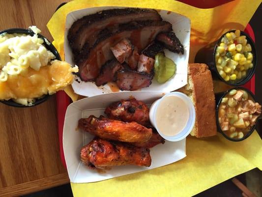 Brisket and chicken wings with Brunswick stew, Mac n cheese and corn