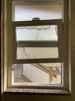 Broken bathroom window