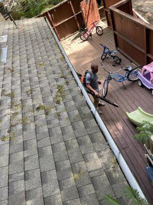 Cleaned gutters and blew all debris off our roof!