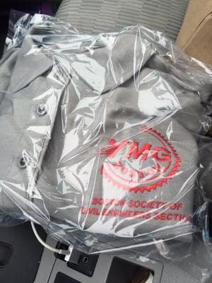 Individually wrapped polo with out embroidered logo.