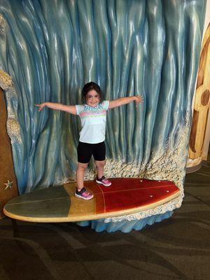 Our girl taking a surf in the waiting room 