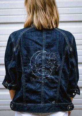 This Jean Jacket was hand painted by a local artist.
