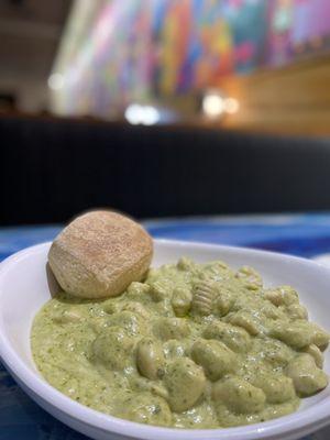 The too raw/undercooked potato gnocchi with bland pesto cream sauce