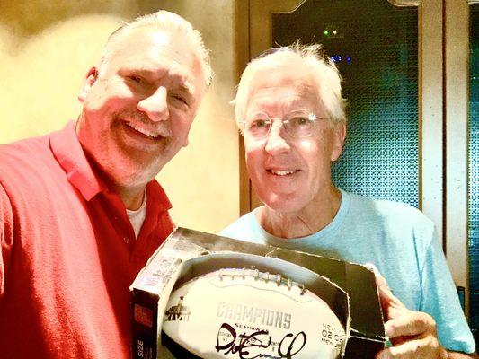 Tuning Pete Carroll's piano :-)
He signed my Super Bowl football too !!