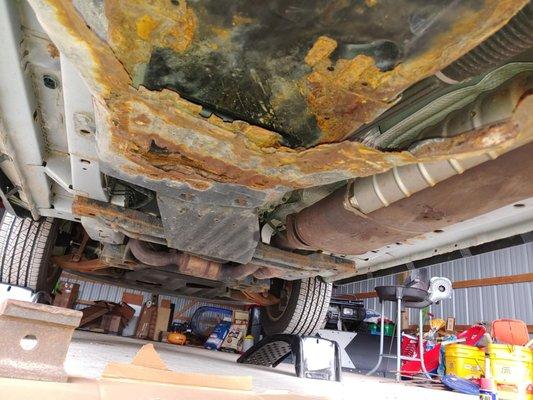 This is the underside of the Jeep Grand Cherokee that was advertised to us as having "no rust".