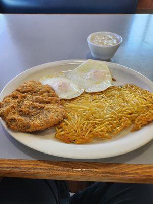 Chicken fried steak & eggs with gravy sausage