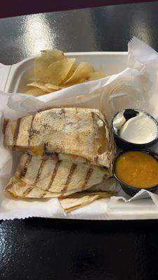 Chicken, mushroom and onion quesadilla.