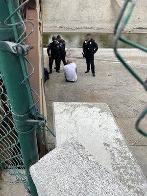 there was homeless people outside in front of school under